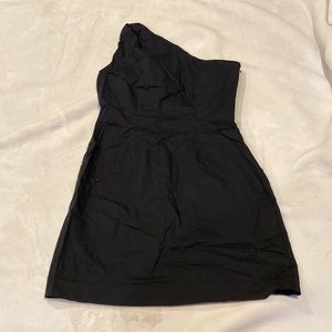 Dress that has one arm strap.